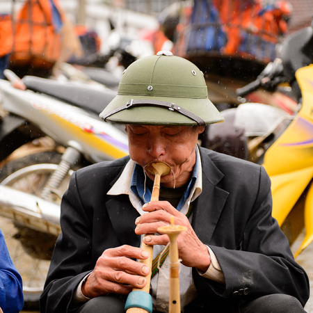 BAC HA, VIETNAM - SEP 21, 2014: Unidentified musicians at the Bac Ha Market, a large Sunday market with people wearing beautiful colored minorities costumesのeditorial素材