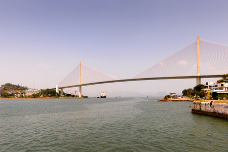 HA LONG CITY, VIETNAM - SEP 23, 2014: Bridge of the Halong city where many touristic boat start jorneys over the Halong bay which is UNESCO World heritageのeditorial素材