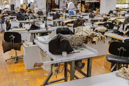 GREECE - APR 22, 2016: Fur coat making factory of Papandopulos in Kastoria, Greece. Very populat brand of Greek made fir coatsのeditorial素材