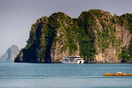 HA LONG BAY, VIETNAM - SEP 23, 2014: Touristic Boat in the Halong bay, Vietnam. UNESCO World Heritageのeditorial素材