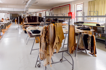 GREECE - APR 22, 2016: Fur coat making factory of Papandopulos in Kastoria, Greece. Very populat brand of Greek made fir coatsのeditorial素材