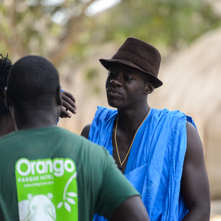 ORANGO ISLAND, GUINEA BISSAU - MAY 3, 2017: Unidentified local people talk about something in the Etigoca village. People in G.-Bissau suffer of poverty due to the bad economyのeditorial素材
