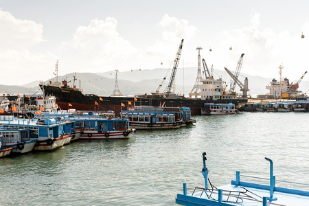 NHA TRANG, VIETNAM - SEP 30, 2014: Boats at the port of Nha Trang on the South China Sea, Vietnam. South China Sea is 3,500,000 square kilometresのeditorial素材