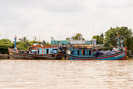 TIEN GIANG, VIETNAM - OCT 5, 2014: Mekong river in Southern Vietnam. Mekong is the 12th-longest river and flows trough China, Burma, Laos, Thailand, Cambodia, Vietnamのeditorial素材