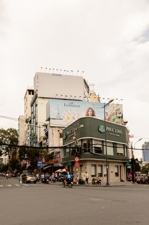 HO CHI MINH, VIETNAM - OCT 5, 2014: Architecture, traffic, ads, advertisements in the centre of Hochiminh (Saigon). Saigon is the largest city in Vietnamのeditorial素材