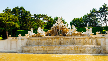 VIENNA, AUSTRIA - JUNE 14: Neptun fountain in the gardens of Schonbrunn Palace on June, 17, 2013 in Vienna, Austria. It was a royal residence of Franz Joseph and Elisabethのeditorial素材