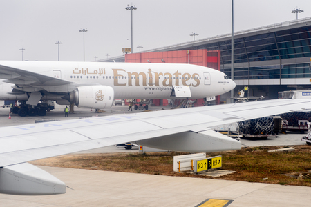 NEW DELHI, INDIA - JAN 16, 2016: Emirates airplane at the Indira Gandhi International Airport, the busiest airport in the countryのeditorial素材
