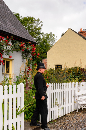 BUNRATTY, IRELAND - JULY 13, 2016: Unidentified Policeman  in Bunratty  (End of the Raite river) is an authentic small village in County Clare, Irelandのeditorial素材