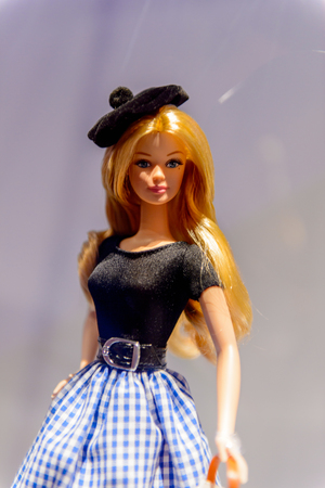 ROME, ITALY - MAY 7, 2016: France style Barbie doll with a basket at the exhibition in Rome. Barbie  brand belongs to the American toy-company Mattel, Incのeditorial素材
