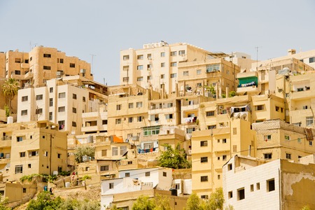 AMMAN, JORDAN - MAY 3, 2014: Cityscape of Amman. Amman is the capital and most populous city of the...