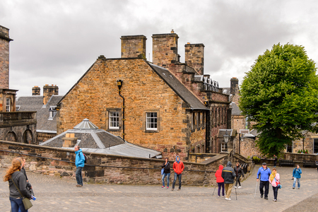 EDINBURGH, SCOTLAND - JULY 17, 2016:  Unidentified tourists visit the Edinburgh Castle. The Castle was involved in many historical conflicts since 14th centuryのeditorial素材