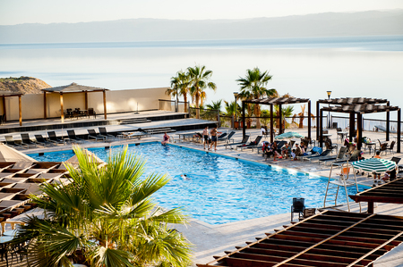 DEAD SEA RESORT, JORDAN - APR 30, 2014: SPA Hotel at the Dead Sea coast in Jordan. Dead Sea water is...