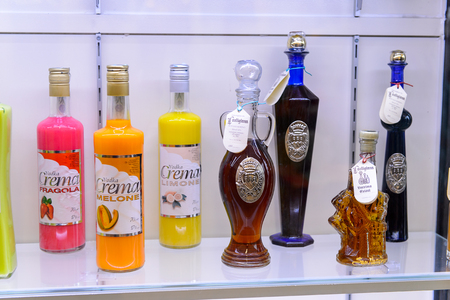 CITY OF SAN MARINO, SM - MAY 11, 2016: Bottles on the shelves of the PicNic shop, a place where the tourist can buy the local alcoholic drinksのeditorial素材