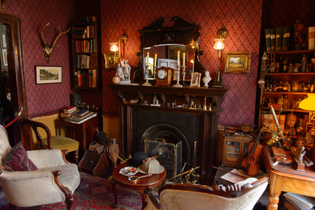 LONDON, ENGLAND - JUL 22, 2016: Main living room of the Sherlock Holmes Museum, 221 Baker Street, London. Sherlock Holmes  is a fictional private detective created by Sir Arthur Conan Doyleのeditorial素材