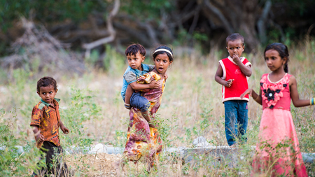 SOCOTRA, YEMEN - JAN 14, 2014: Unidentified Yemeni children play on the  Socotra Archipelago. Children on the  Socotra Archipelago grow without educationのeditorial素材