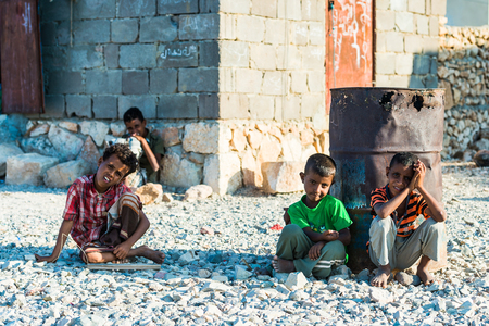 SOCOTRA, YEMEN - JAN 15, 2014: Unidentified Yemeni children in the street on the Socotra Archipelago. Unfortunately Children on the  Socotra Archipelago grow without educationのeditorial素材