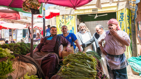SANA'A, YEMEN - JAN 11, 2014: Unidentified Yemeni local people work at the market. People of Yemen suffer of poverty due to the unstable political and poor economical situationのeditorial素材