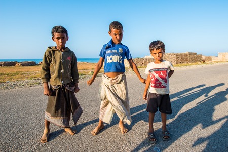 SOCOTRA, YEMEN - JAN 15, 2014: Unidentified Yemeni children play in the street on the Socotra Archipelago. Children on the  Socotra Archipelago grow without educationのeditorial素材