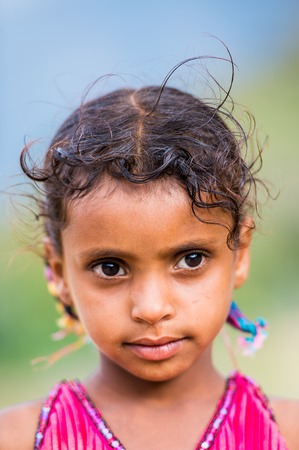 SOCOTRA, YEMEN - JAN 14, 2014: Unidentified Yemeni girl portrait on the Socotra Archipelago. Children on the  Socotra Archipelago live in poverty and grow without educationのeditorial素材