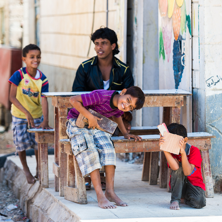 HADIBU, SOCOTRA ARCHIPELAGO, YEMEN - JAN 14, 2014: Unidentified Yemeni children in the street of Hadibu on the  Socotra Archipelago. Socotra Archipelago is the Unesco World Heritageのeditorial素材