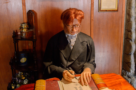 LONDON, ENGLAND - JUL 22, 2016: Character from the stories at the Sherlock Holmes Museum, 221 Baker Street, London. Sherlock Holmes  is a fictional private detective created by Sir Arthur Conan Doyleのeditorial素材