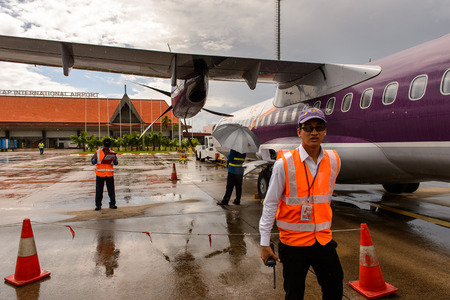 SIEM REAP, CAMBODIA - SEP 26, 2014: CLose view of the Cambodia Angkor Air plane in the Siemreap International Airport. It is the busiest airport in Cambodia in terms of passenger traffic.のeditorial素材