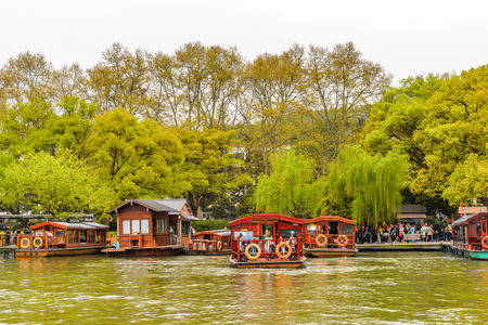 HANGZHOU, CHINA - APR 2, 2016: Traditional Chinese boat at the West Lake (Xi hu lake) is a freshwater lake in Hangzhou. UNESCO World Heritage Site
(West Lake Cultural Landscape of Hangzhou)のeditorial素材