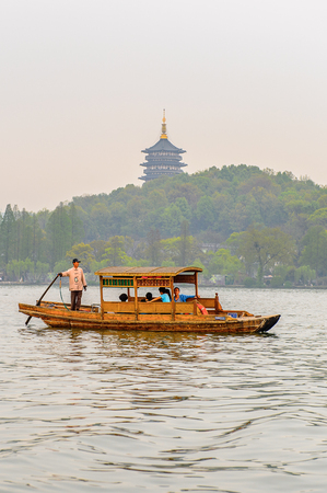 HANGZHOU, CHINA - APR 2, 2016: Traditional Chinese boat at the West Lake (Xi hu lake) is a freshwater lake in Hangzhou. UNESCO World Heritage Site
(West Lake Cultural Landscape of Hangzhou)のeditorial素材