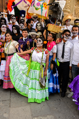OAXACA, MEXICO - OCT 31, 2016: Unidentified girl dressed and dances for the Day of the Dead (Dia de los Muertos), national Mexican holiday, UNESCO Intangible Cultural Heritage of Humanityのeditorial素材