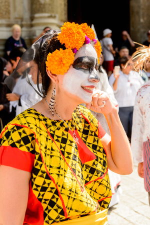 OAXACA, MEXICO - OCT 31, 2016: Unidentified girl dressed for the Day of the Dead (Dia de los Muertos), national Mexican holiday, UNESCO Intangible Cultural Heritage of Humanityのeditorial素材