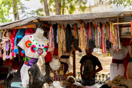 OAXACA, MEXICO- OCT 31, 2016: Market place (the main square Zocalo of Oaxaca) with the original traditional Mexican souvenirs and clothing, which are popular among the tourists.のeditorial素材