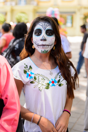OAXACA, MEXICO - OCT 31, 2016: Unidentified girl dressed as zombie for the Day of the Dead (Dia de los Muertos), national Mexican holiday, UNESCO Intangible Cultural Heritage of Humanityのeditorial素材
