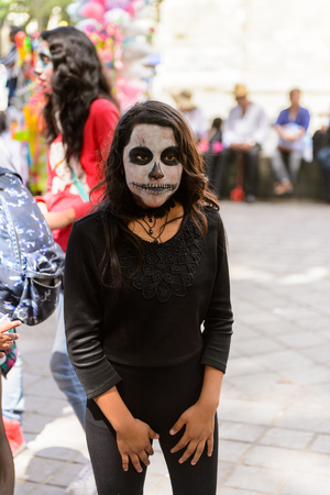 OAXACA, MEXICO - OCT 31, 2016: Unidentified girl dressed and painted for the Day of the Dead (Dia de los Muertos), national Mexican holiday, UNESCO Intangible Cultural Heritage of Humanityのeditorial素材
