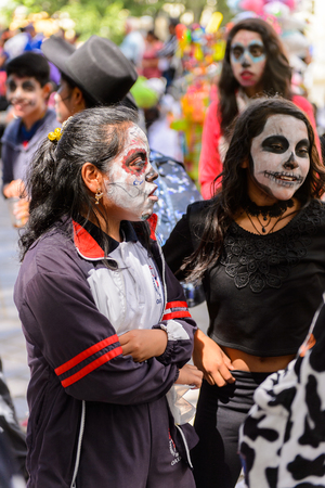 OAXACA, MEXICO - OCT 31, 2016: Unidentified girl dressed and painted for the Day of the Dead (Dia de los Muertos), national Mexican holiday, UNESCO Intangible Cultural Heritage of Humanityのeditorial素材