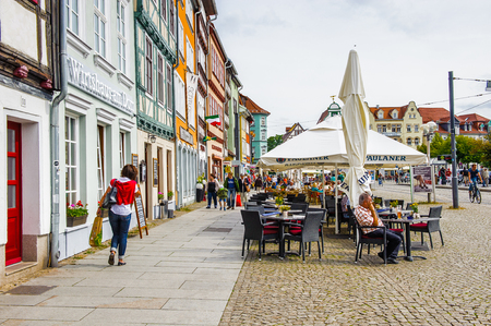 ERFURT, GERMANY  - JUN 16, 2014: Small cafe of the downtown of the city of Erfurt, Germany. Erfurt is the Capital of Thuringia and the city was first mentioned in 742のeditorial素材