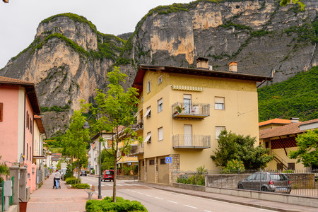 MEZZOCORONA, ITALY - MAY 2, 2016: Houses in front of the mountain in Mezzocorona, Italy.  A comune in Trentino in the northern Italian region Trentino-Alto Adige Sudtirolのeditorial素材