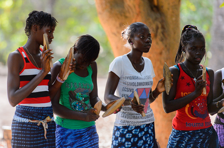 Kaguit vil., SENEGAL - APR 30, 2017: Unidentified Diola women hold the special attributes during a...