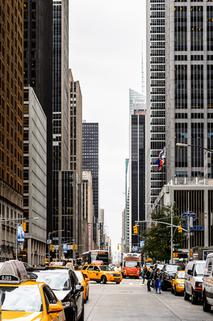 NEW YORK, USA - SEP 22, 2015: Skyscapers of the 6th avenue (Avenue of the Americas), 6 km long