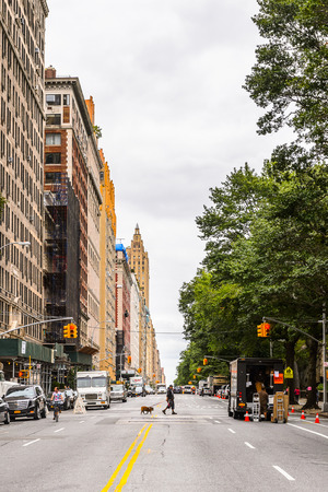 NEW YORK, USA - SEP 22, 2015: Traffic on the Eighth avenue (Manhattan). 8 avenue begins in the West Village neighborhood at Abingdon Squareのeditorial素材