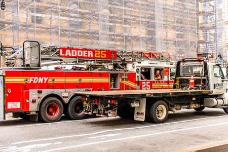 NEW YORK, USA - SEP 22, 2015: Fire car on the Eighth avenue (Manhattan). 8 avenue begins in the West...