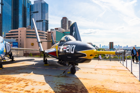 NEW YORK, USA - SEP 25, 2015: Militar aircraft on USS Intrepid (The Fighting I), one of 24 Essex-class aircraft carriers built during World War II for the United States Navyのeditorial素材
