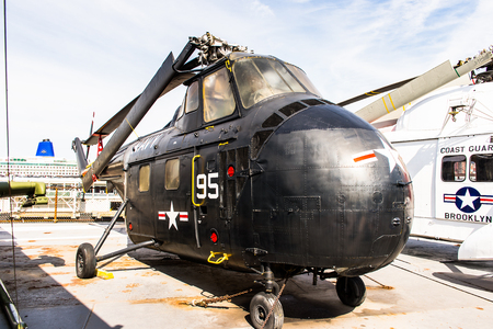 NEW YORK, USA - SEP 25, 2015: Militar Helicopter on USS Intrepid (The Fighting I), one of 24 Essex-class aircraft carriers built during World War II for the United States Navyのeditorial素材