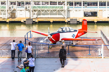 NEW YORK, USA - SEP 25, 2015: Militar aircraft on USS Intrepid (The Fighting I), one of 24 Essex-class aircraft carriers built during World War II for the United States Navyのeditorial素材