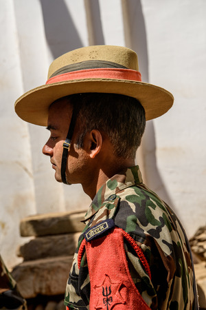KATMANDU, NEPAL - MAR 6, 2017: Unidentified Chhetri man in military form looks down. Chhetris is the most populous ethnic group of Nepalのeditorial素材