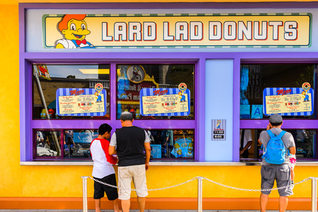 LOS ANGELES, USA - SEP 27, 2015: Lard Lad donuts at The SImpsons area of the Universal Studios Hollywood Park. The Simpsons is an American animated sitcom by Matt Groeningのeditorial素材