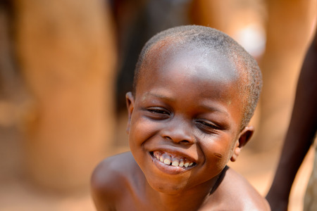 PIRA, BENIN - JAN 12, 2017: Unidentified Beninese little boy smiles. Benin children suffer of poverty due to the bad economy.のeditorial素材
