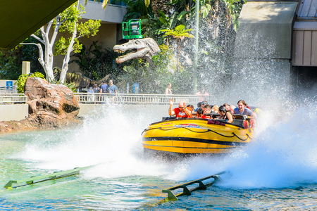 LOS ANGELES, USA - SEP 27, 2015: Water attraction in the Jurassic Park area in the Universal Studios Hollywood Park. Jurassic Park is a 1993 American adventure film  by Steven Spielbergのeditorial素材