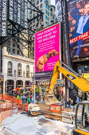 NEW YORK, USA - OCT 7, 2015: Architecture and traffic of Times Square, a major commercial neighborhood in Midtown Manhattan, New York Cityのeditorial素材