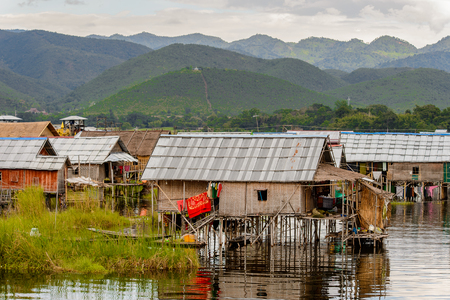 INLE LAKE, MYANMAR - AUG 30, 2016: Nature of the Inpawkhon village over the Inle Sap,a freshwater lake in the Nyaungshwe Township of Taunggyi District of Shan State, Myanmarのeditorial素材