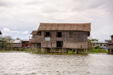INLE LAKE, MYANMAR - AUG 30, 2016: Inpawkhon village over the Inle Sap,a freshwater lake in the Nyaungshwe Township of Taunggyi District of Shan State, Myanmarのeditorial素材